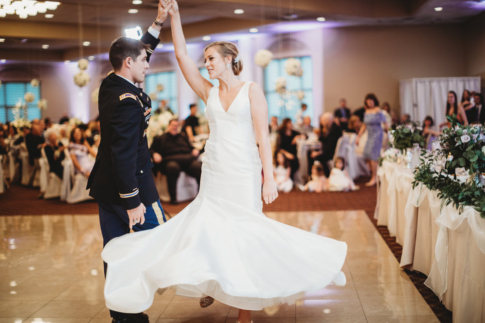 Bride and groom dancing at Villa cesear
