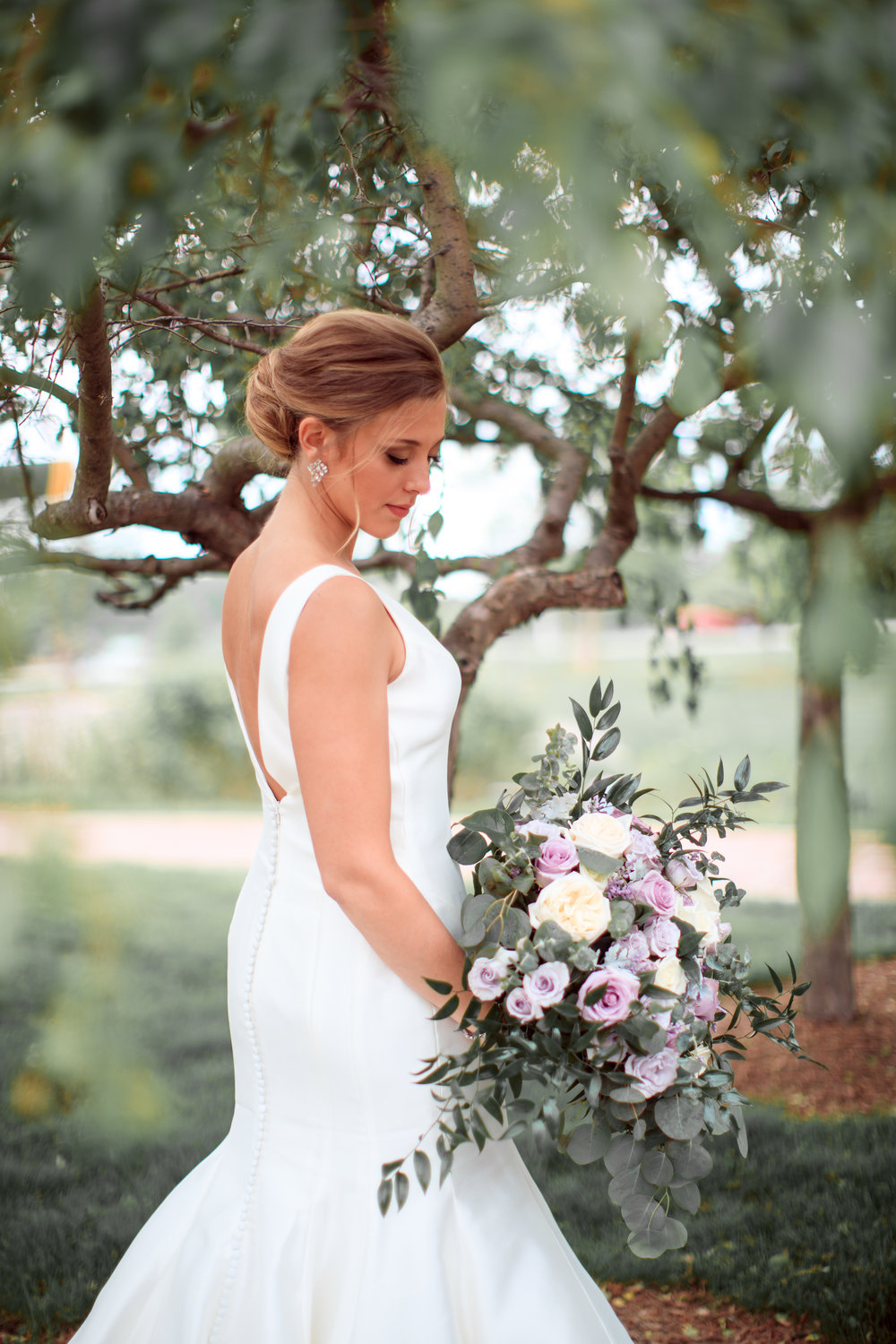 bride with stunning flowers from kathys florist