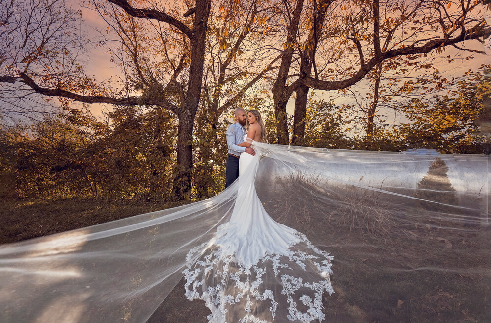 iowa wedding photography of a bride with flowing dress outdoors in the fall