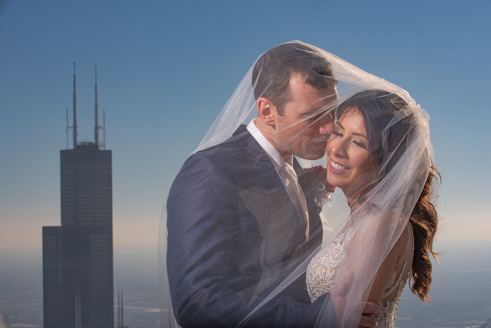 on top of trump tower chicago bride and groom wedding photography by lauren ashley studios