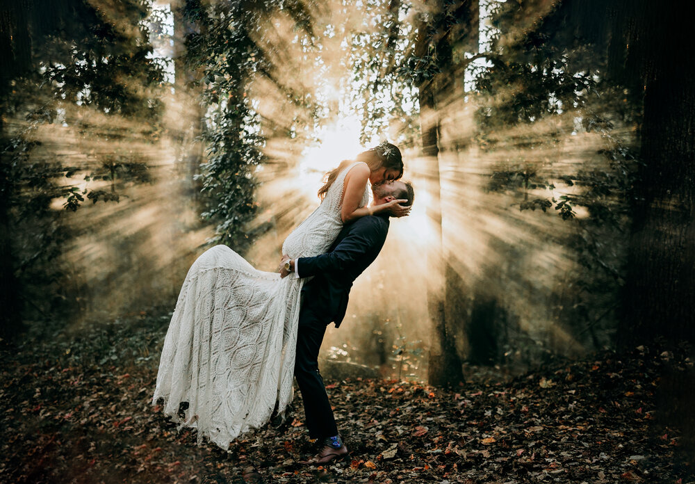 outdoor wedding photography bride groom in misty forest kiss