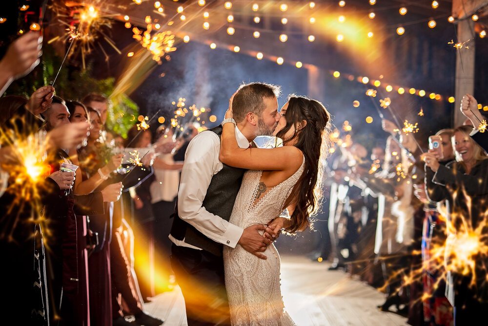 wedding photographer lauren ashley studios sparklers creative bride groom kiss photography